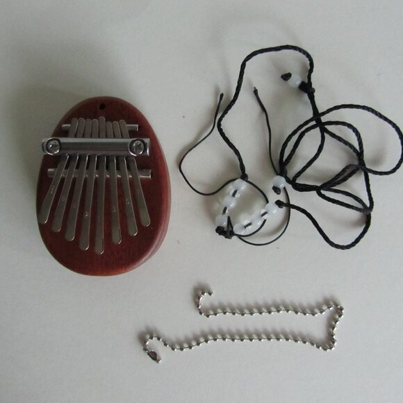 New Mini Kalimba 8 Key Thumb Piano 1 Pack Water Drop Style Instrument Portable - Picture 4 of 8